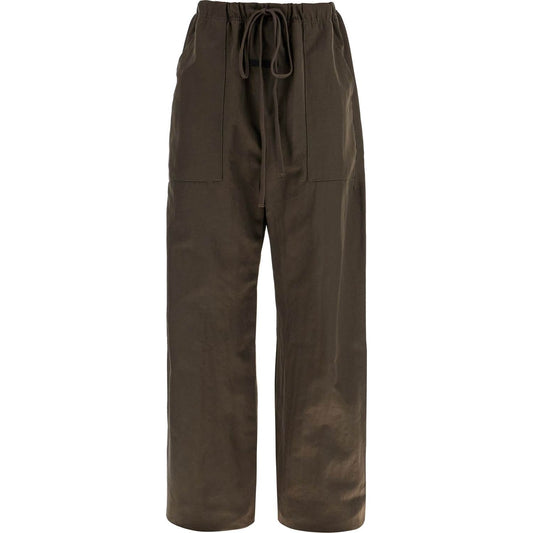 Fear Of God ESSENTIALS textured nylon utility pants for versatile Trousers Fear Of God ESSENTIALS