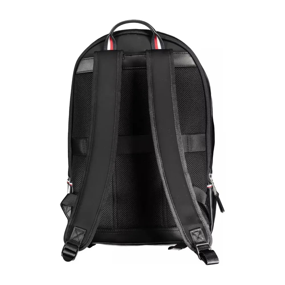 Front view with bag zipped and handles upright.