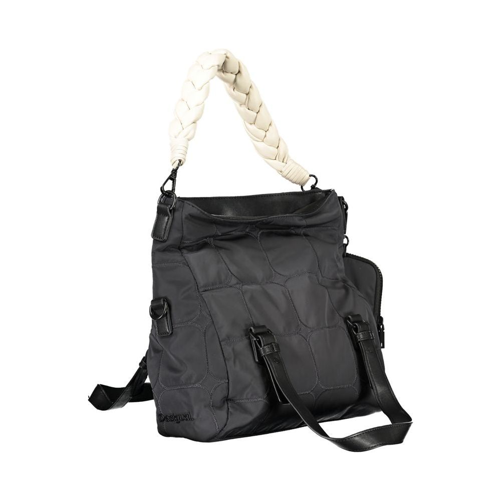 Front view with bag zipped and handles upright.