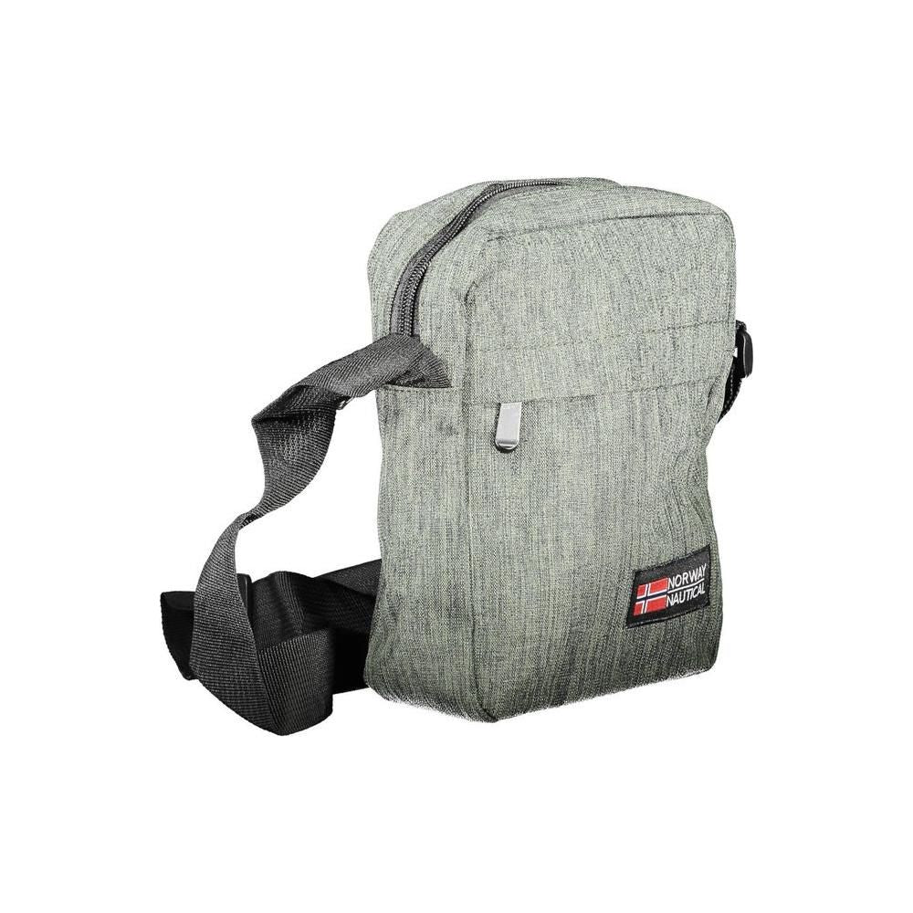 Front view with bag zipped and handles upright.