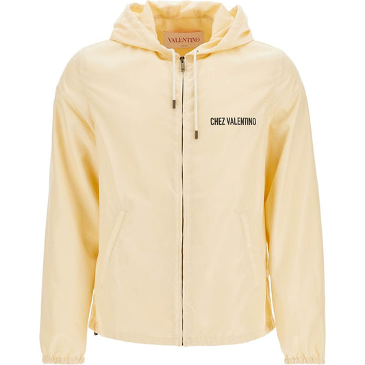 Valentino Garavani beige hooded windbreaker in logoed polyamide